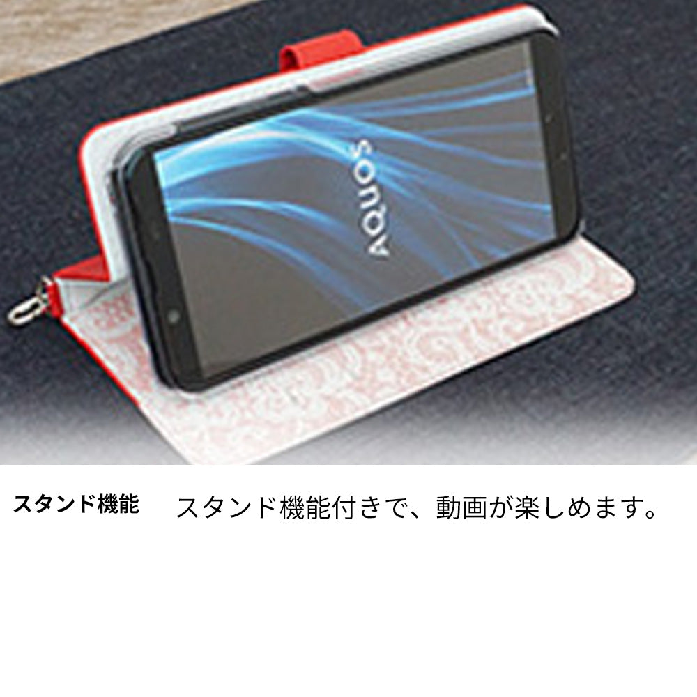 Xperia Z5 SOV32 au スマホケース 手帳型 フリンジ風 ストラップ付 フラワーデコ